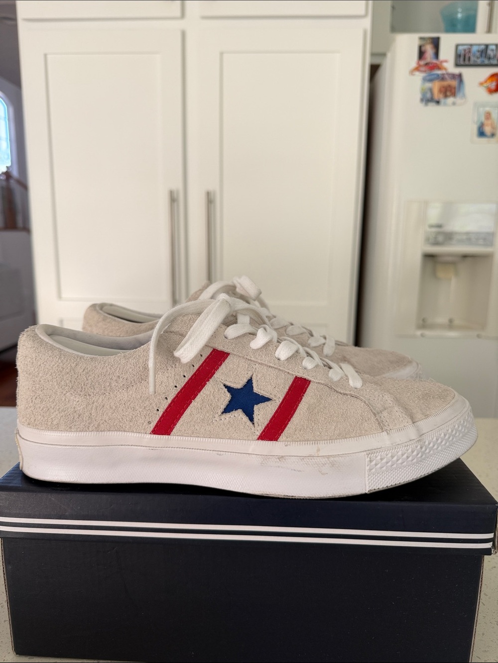 Converse Beige Suede Low-Top Sneakers with Red Stripes and Blue Star